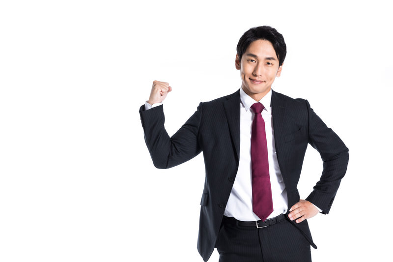 ガッツポーズをしている人